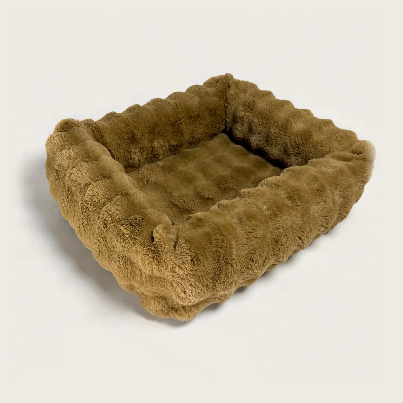 The Bliss Bed in Olive — an olive-green bolster bed in deep, plush faux fur.